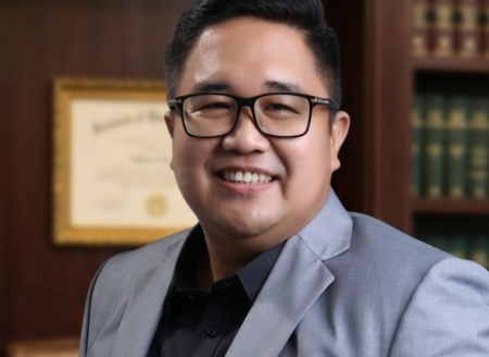 Photo of Atty. Edzel Bert Canlas in the Team Members Section